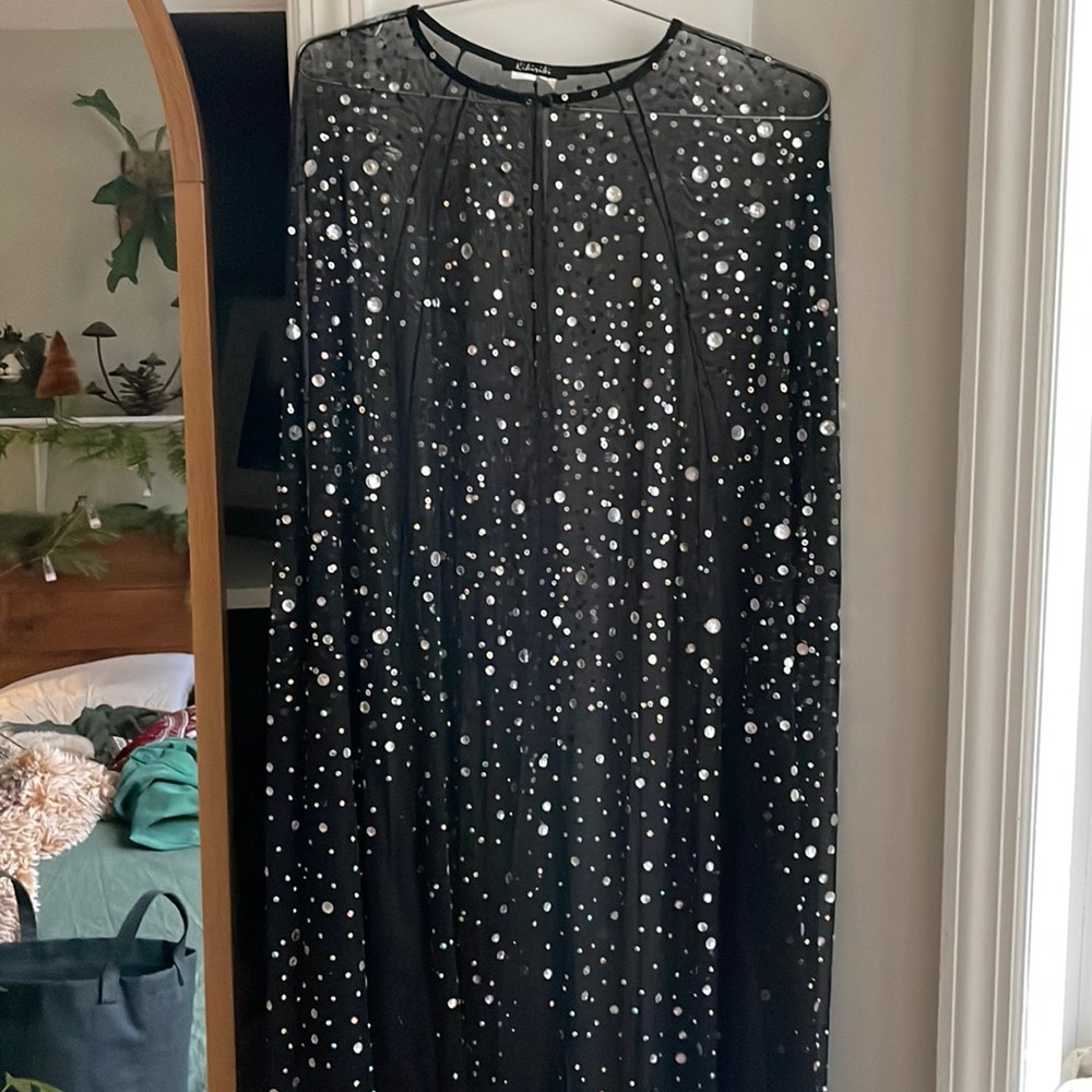 Elegant Black Cape with Silver Accents